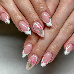 WUHCIM close-up almond press-on nails highlighting French tip detail and durability
