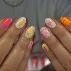 WUHCIM front packaging showing colorful press-on nails and included accessories for quick wear