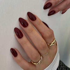 XCREANDO front packaging showing burgundy wine red nails and contents