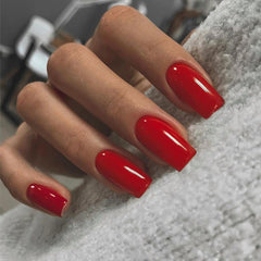 XCREANDO front packaging showing 24-piece red press-on nails and convenience