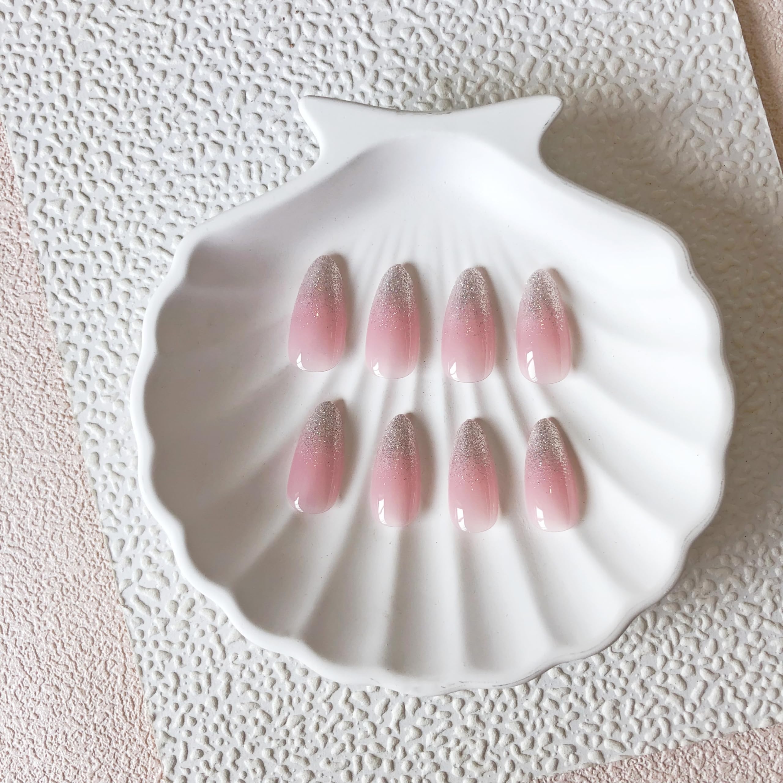 XCREANDO laid-out 24 nails displaying full size range for better fit options