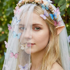 Xelsluthe butterflies decorating a bridal bouquet adding delicate visual interest