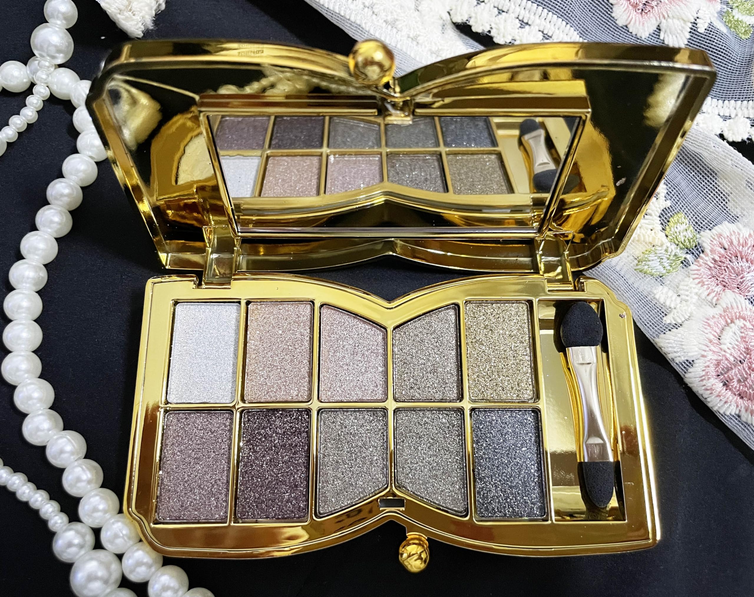 XFEXM open compact with mirror displaying full shade selection for travel convenience