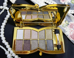XFEXM open compact with mirror displaying full shade selection for travel convenience