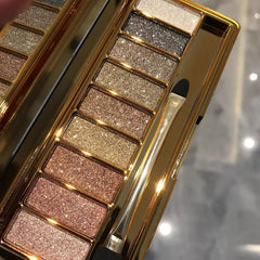 XFEXM palette next to hand showing compact size and portability