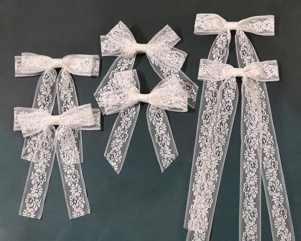 XFYUZR front view showing white lace bow and tails, elegant finishing touch