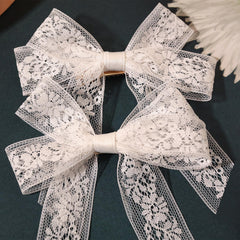 XFYUZR metal clip and bowknot close view, durable secure hold