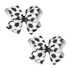 XIELIME front view of soccer bow clip showing black-and-white pattern and branding benefit: team-ready look