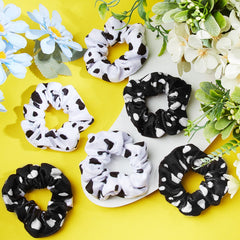 Xinnun scrunchie worn in high ponytail, demonstrates firm no-crease styling