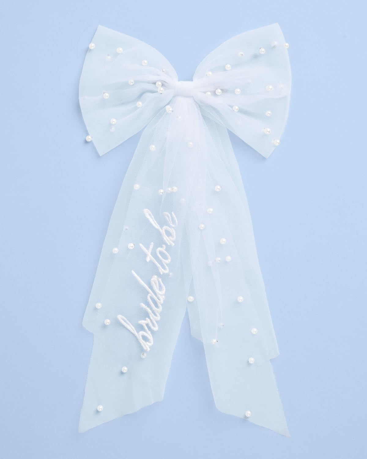 xo, Fetti bow laid out to show 17-inch tail length and scale