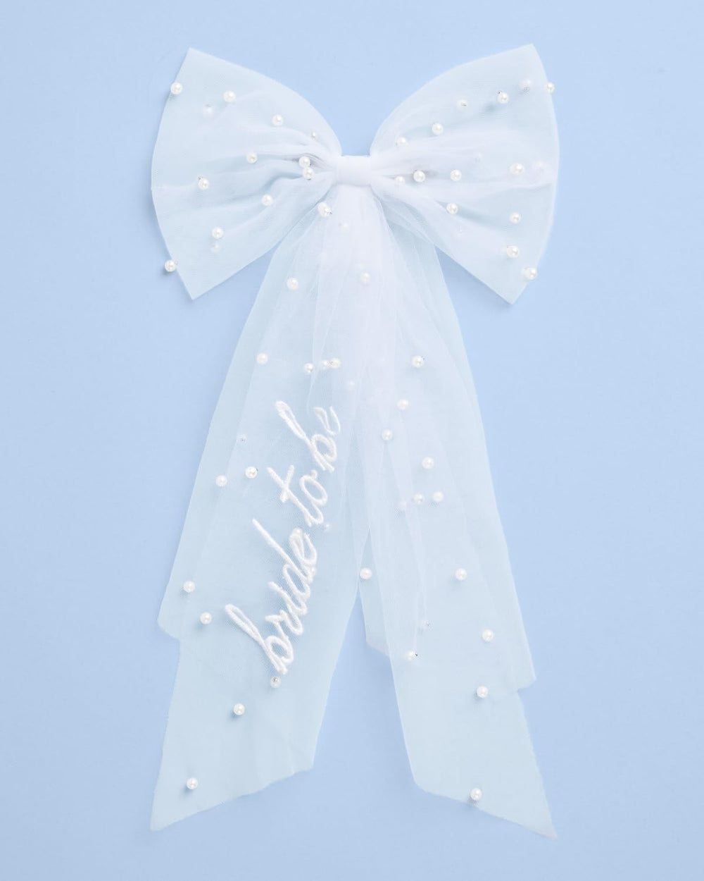 xo, Fetti bow laid out to show 17-inch tail length and scale