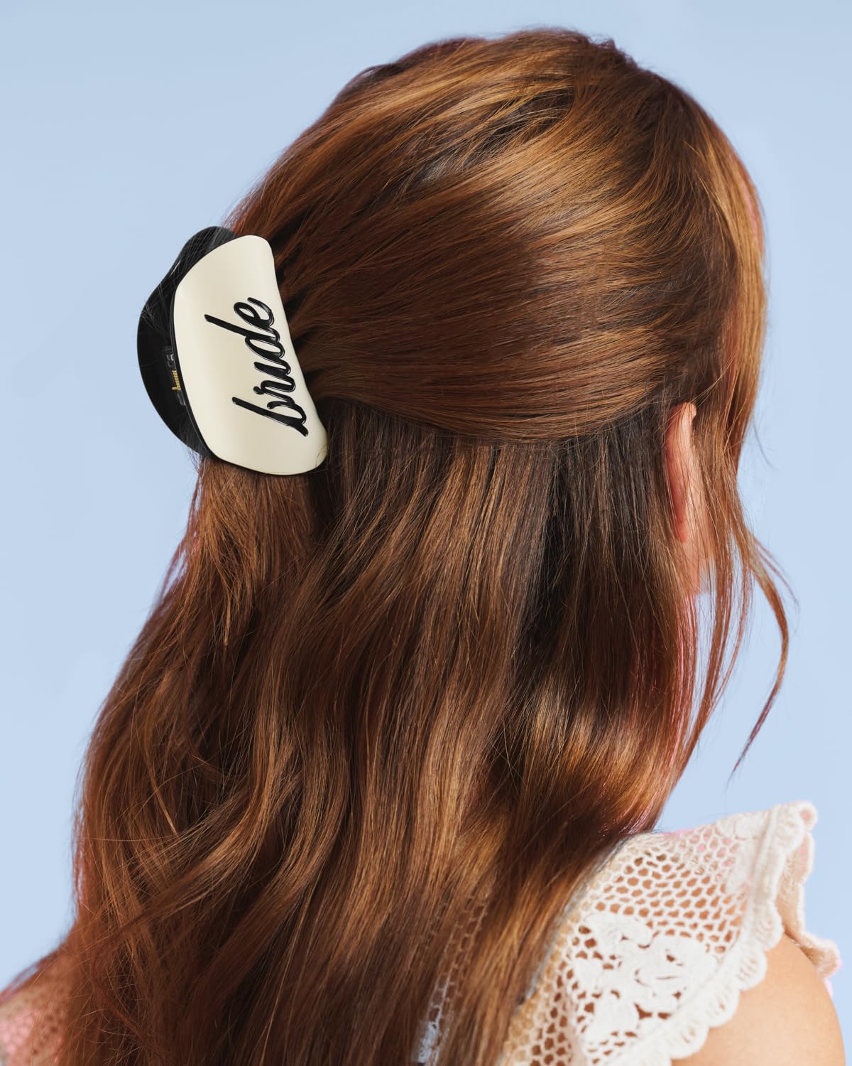 xo, Fetti close-up of recessed "bride" logo highlighting polished detail benefit