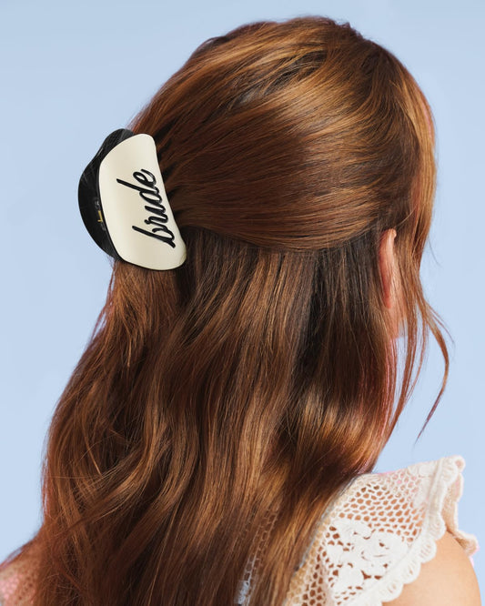 xo, Fetti close-up of recessed "bride" logo highlighting polished detail benefit