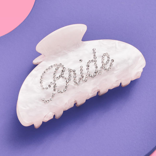 xo, Fetti bride clip front view showcasing pearlescent finish and bridal style