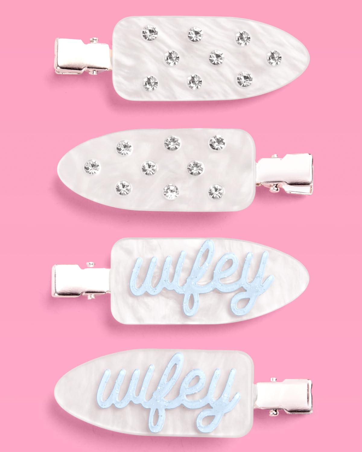 xo, Fetti clips in hand size comparison showing compact portable design
