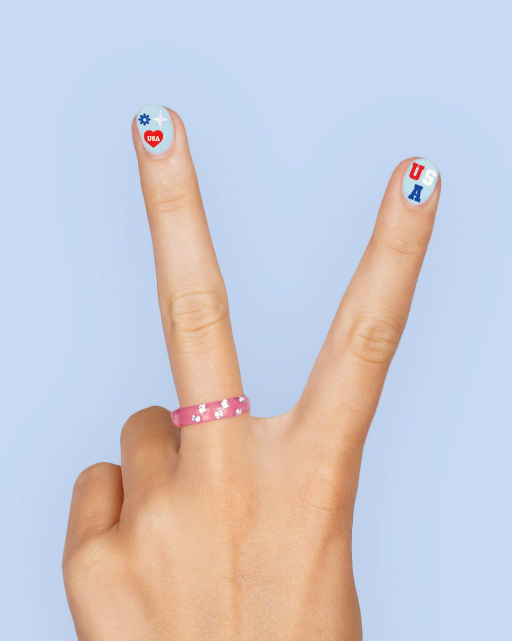 xo, Fetti close detail of cherry and bow stickers for accent nails