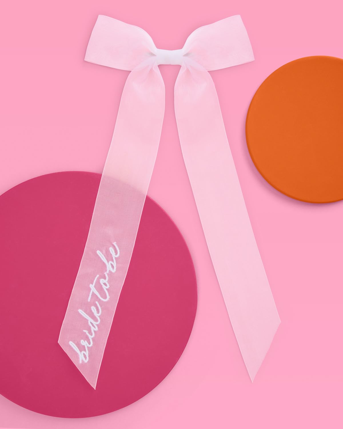 xo, Fetti packaged bow ready to gift highlighting presentable finishing touch
