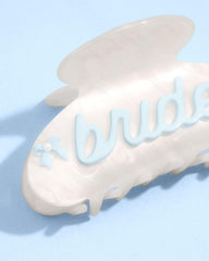 xo, Fetti marble white acrylic texture, luminous finish enhances bridal looks