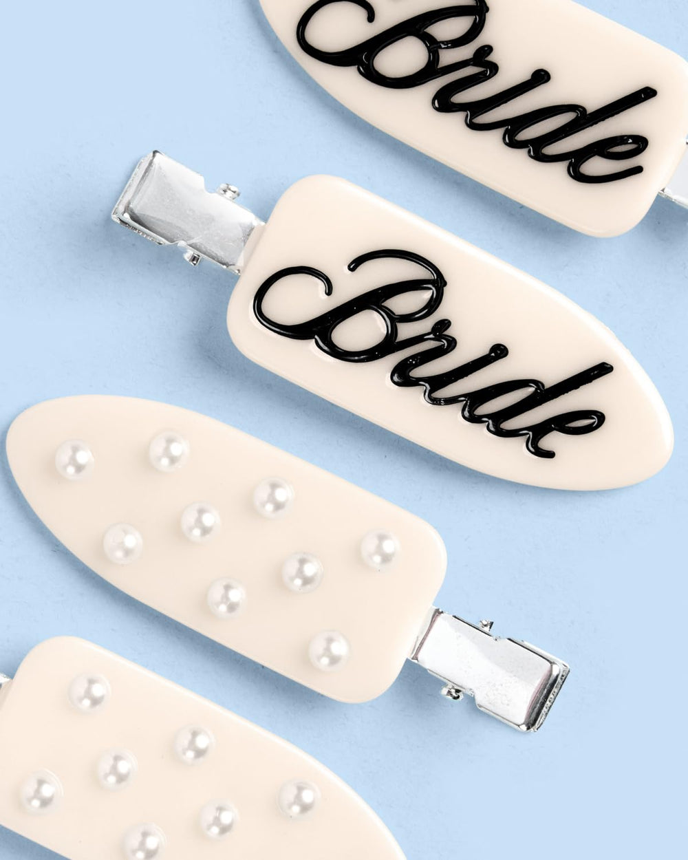 xo, Fetti pearl-studded clip texture emphasizing delicate shine