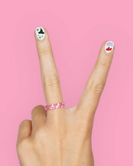 xo, Fetti sticker detail being placed with tweezers for easy precise application benefit