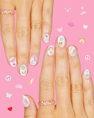 xo, Fetti sticker being placed on a bare nail showing simple quick application