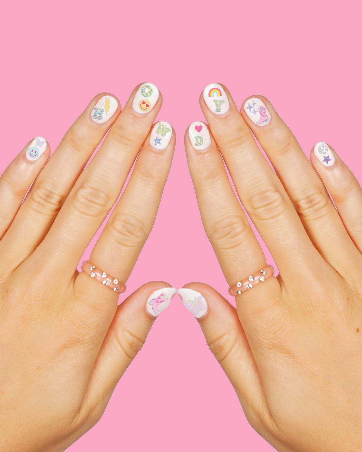 xo, Fetti stickers applied on painted nails demonstrating instant party-ready nails
