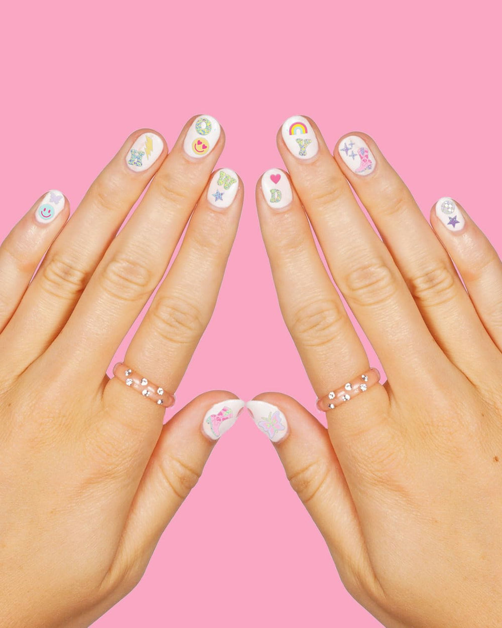 xo, Fetti stickers applied on painted nails demonstrating instant party-ready nails