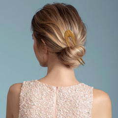 Xthrotsenk lifestyle shot wearing a chignon, adding vintage elegance