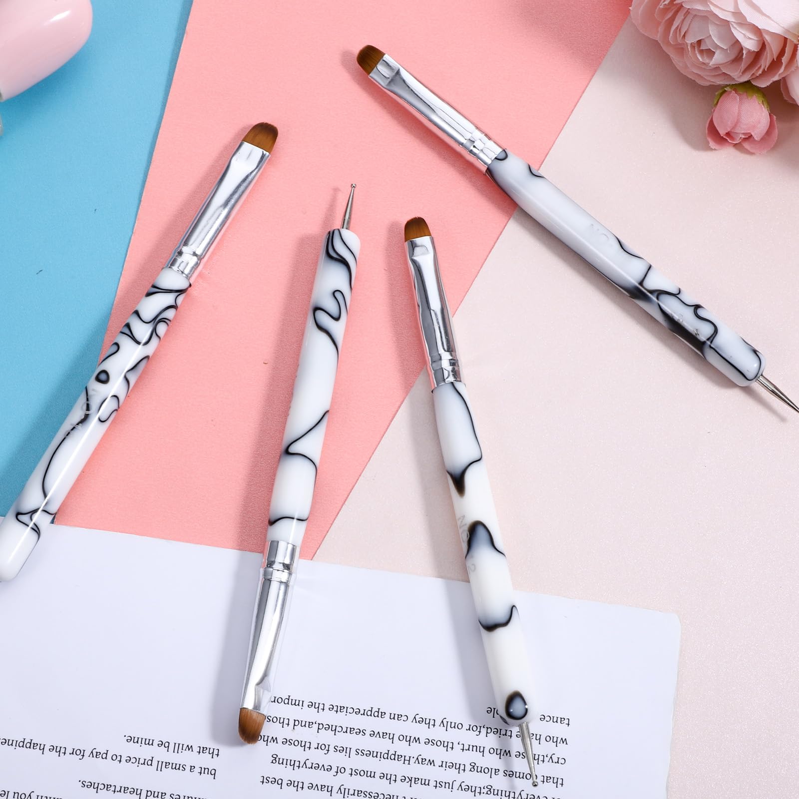 Xthrotsenk brushes next to ruler illustrating size range for precise designs