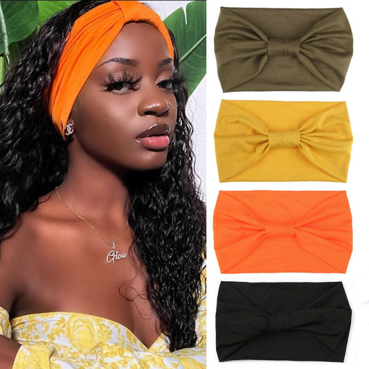 XTREND front view of four wide headbands showing colors and neat fold