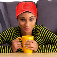 Xuhal model wearing wrap in bed demonstrating crease-free sleeping benefit