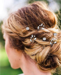 Yandino lifestyle wedding setting showing pins adding polished, romantic accents to bridal look