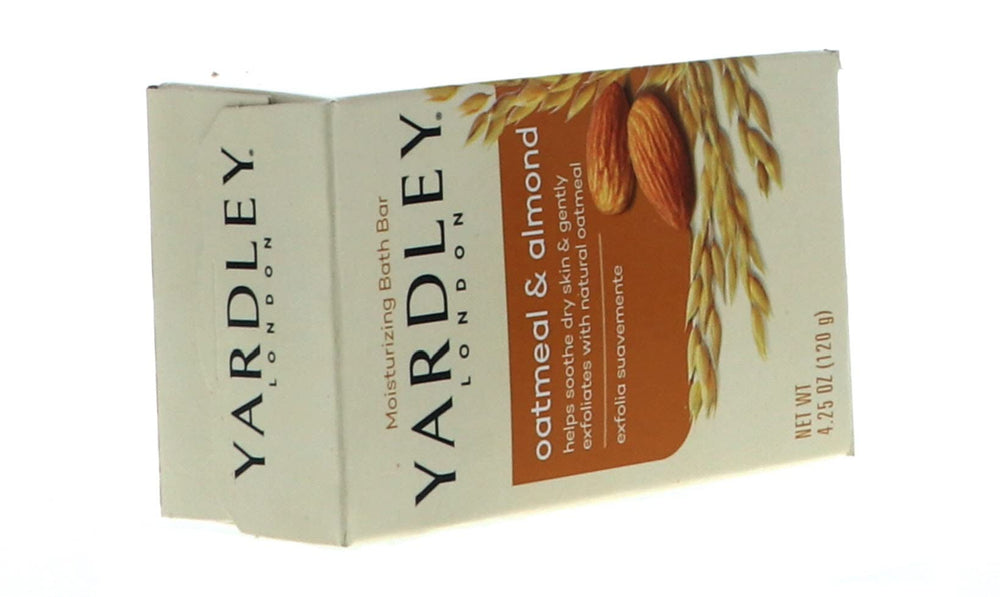 HARMONY almond oil bottle beside bar highlighting nourishing almond oil benefit