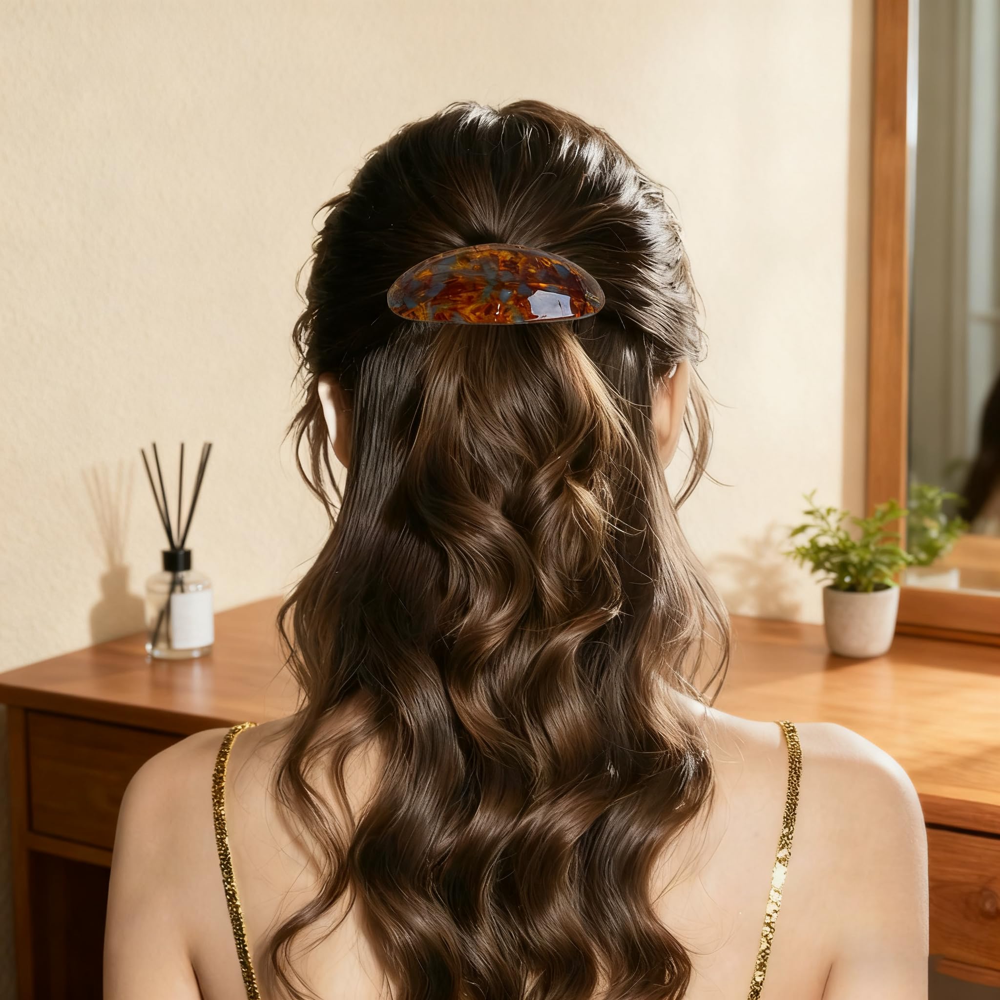 YCKXXL caramel barrette securing a low bun showing polished look and ease benefit