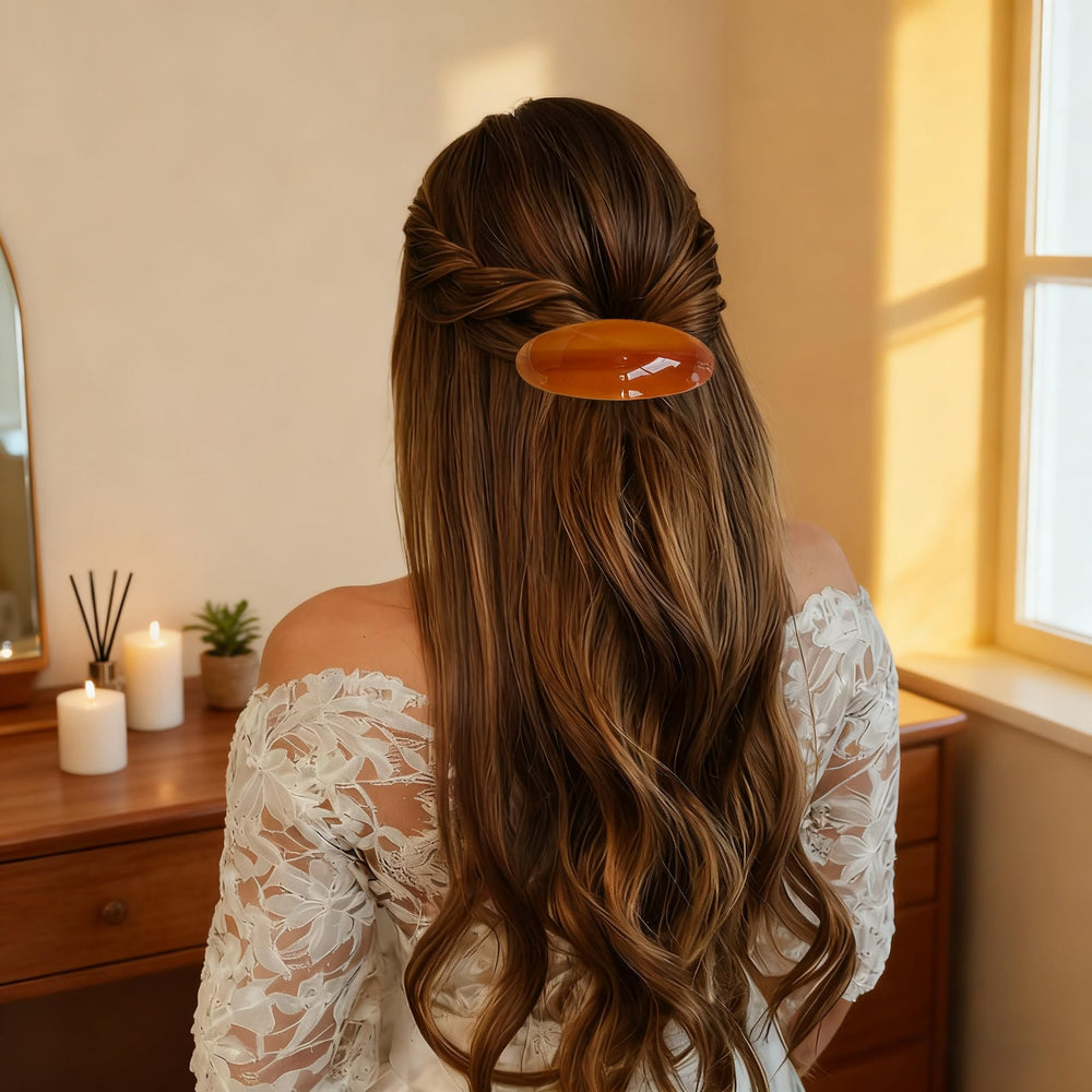 YCKXXL barrette next to hand showing large size and capacity for thick hair benefit