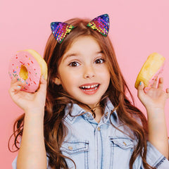 YDDXAQHB in child's ponytail demonstrating secure fit and playful style