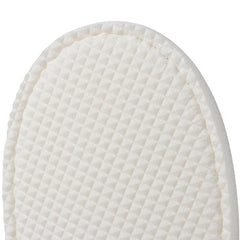 Yeios slippers in suitcase demonstrating travel-friendly portability
