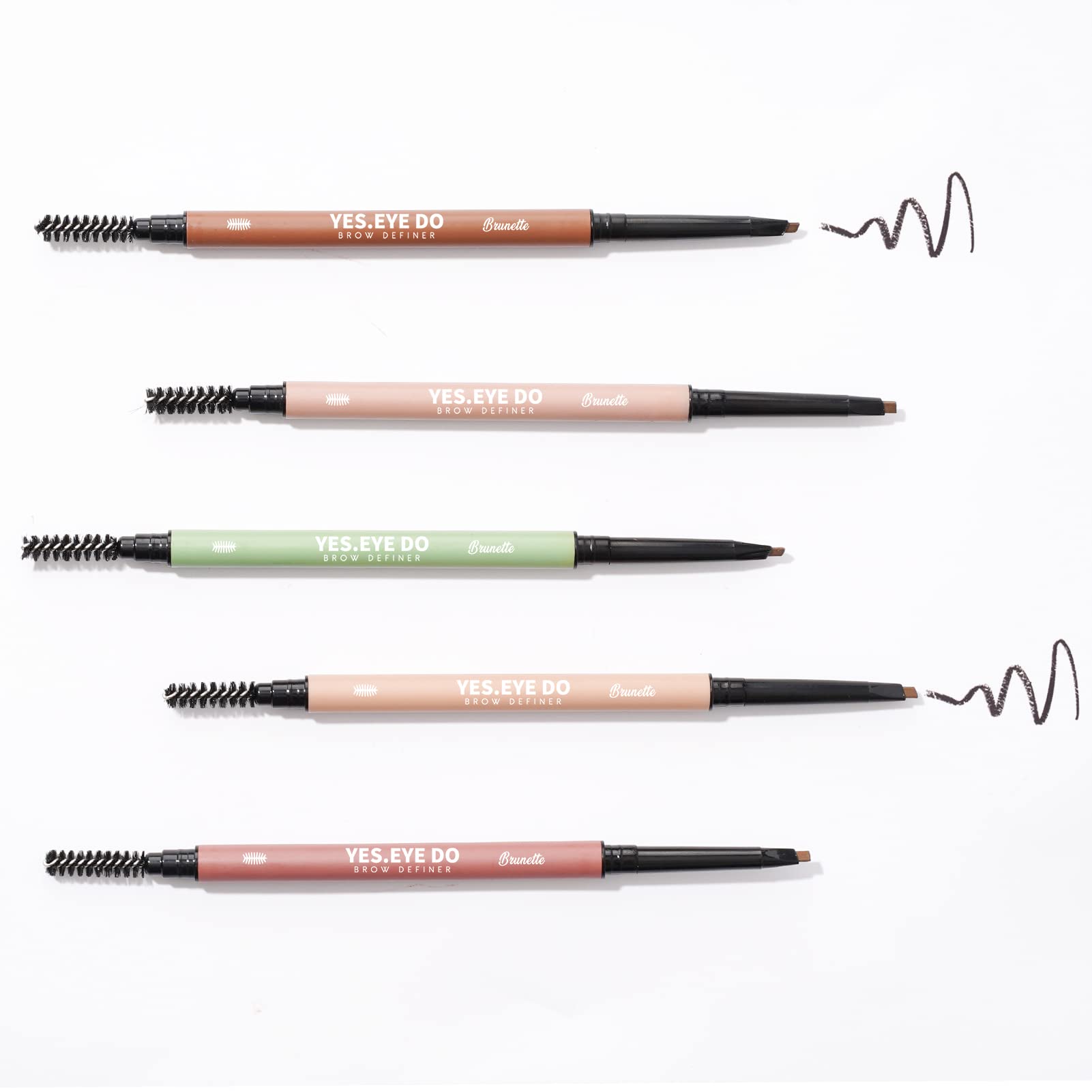 YES.EYE DO pencil held in hand to show compact size and travel convenience