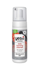 Yes To Tomatoes charcoal texture close-up highlighting active charcoal and gentle cleansing action
