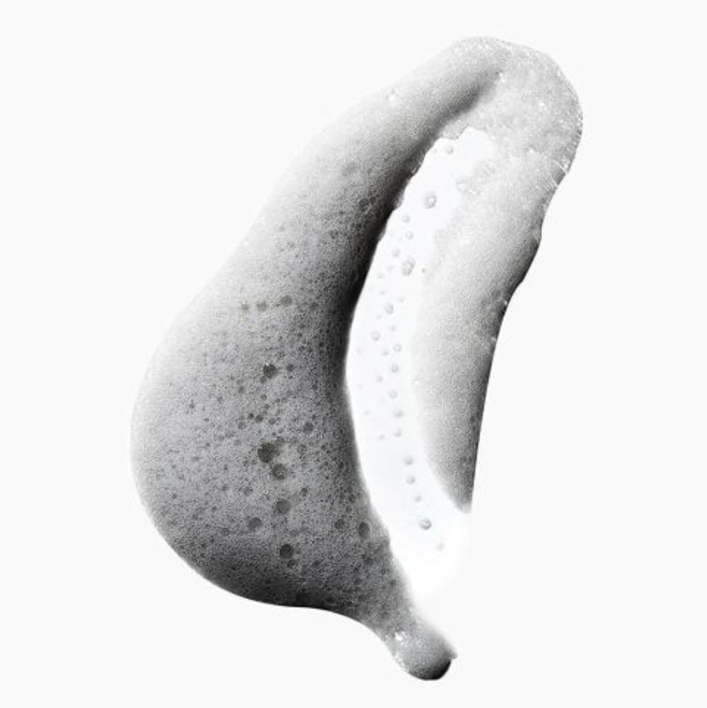 Yes To Tomatoes foam dispensed from pump demonstrating oxygenated texture and easy application
