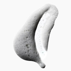 Yes To Tomatoes foam dispensed from pump demonstrating oxygenated texture and easy application