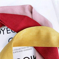 Yeshan array of nine colors laid out showing mix-and-match outfit options