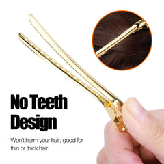 YGDZ clips in hand showing scale and ease of use for styling