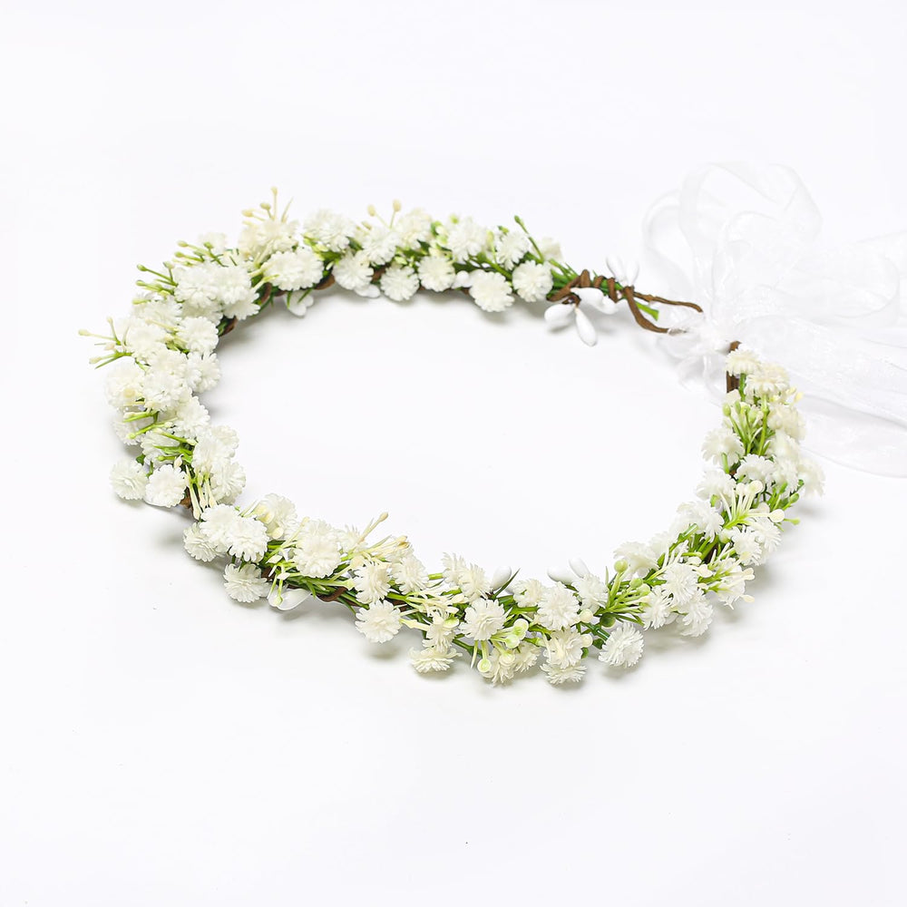 Yili Maizi close-up of artificial white flowers highlighting delicate texture and realism