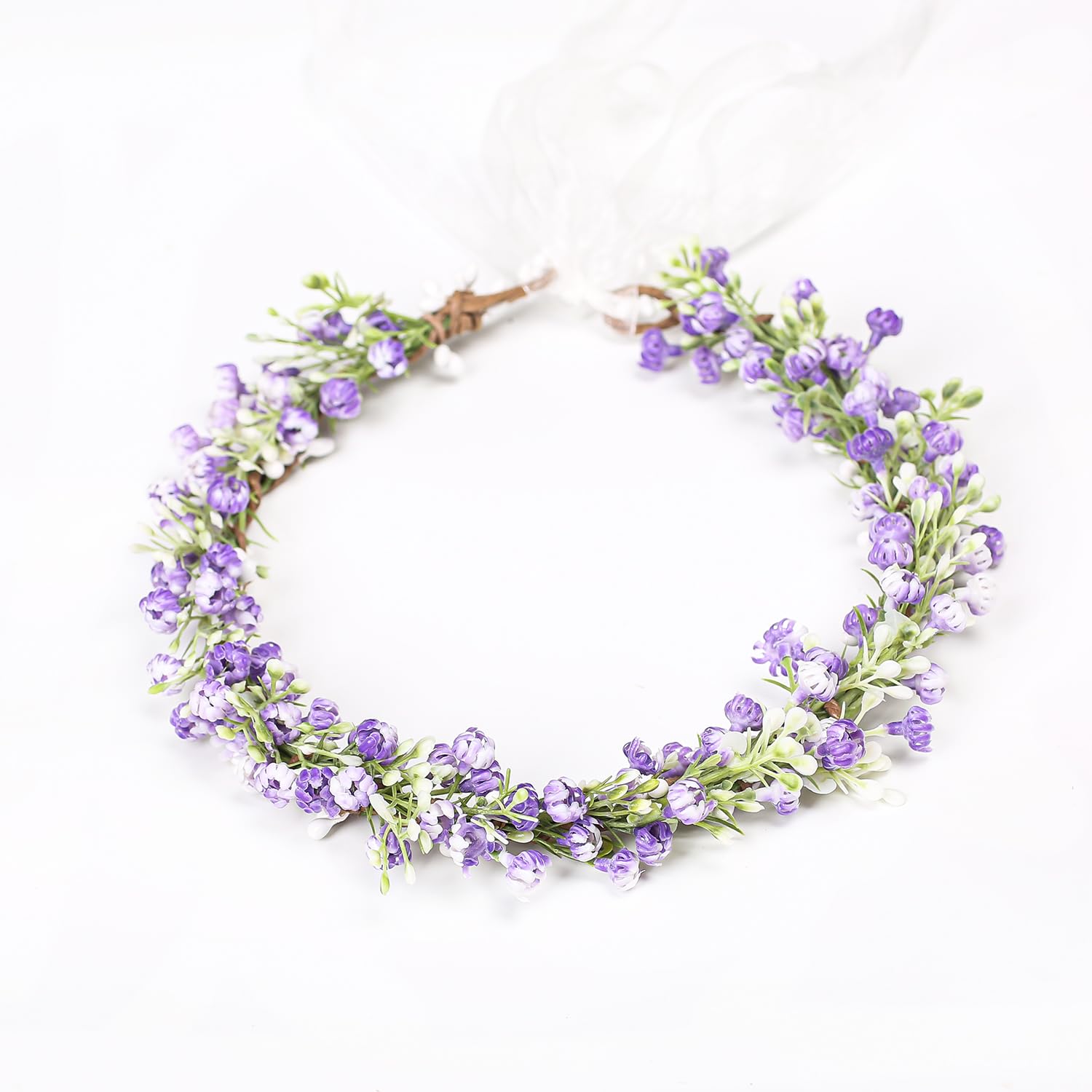 Yili Maizi flower crown on mannequin illustrating fit and maternity shoot styling