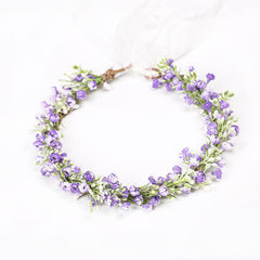 Yili Maizi flower crown on mannequin illustrating fit and maternity shoot styling