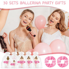 Yinkin favors arranged on a ballet-themed party table for visual impact