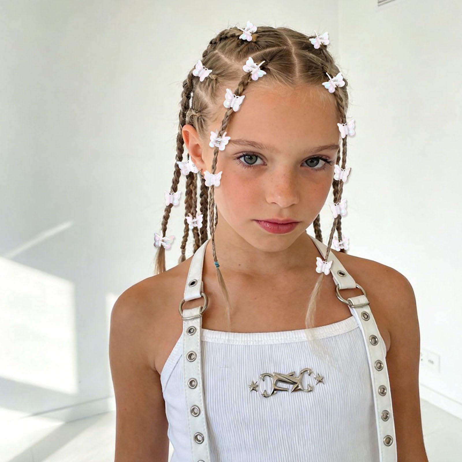 YISSION clips clipped into a braid adding whimsical shimmer for festival styling