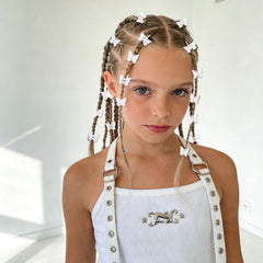 YISSION clips clipped into a braid adding whimsical shimmer for festival styling