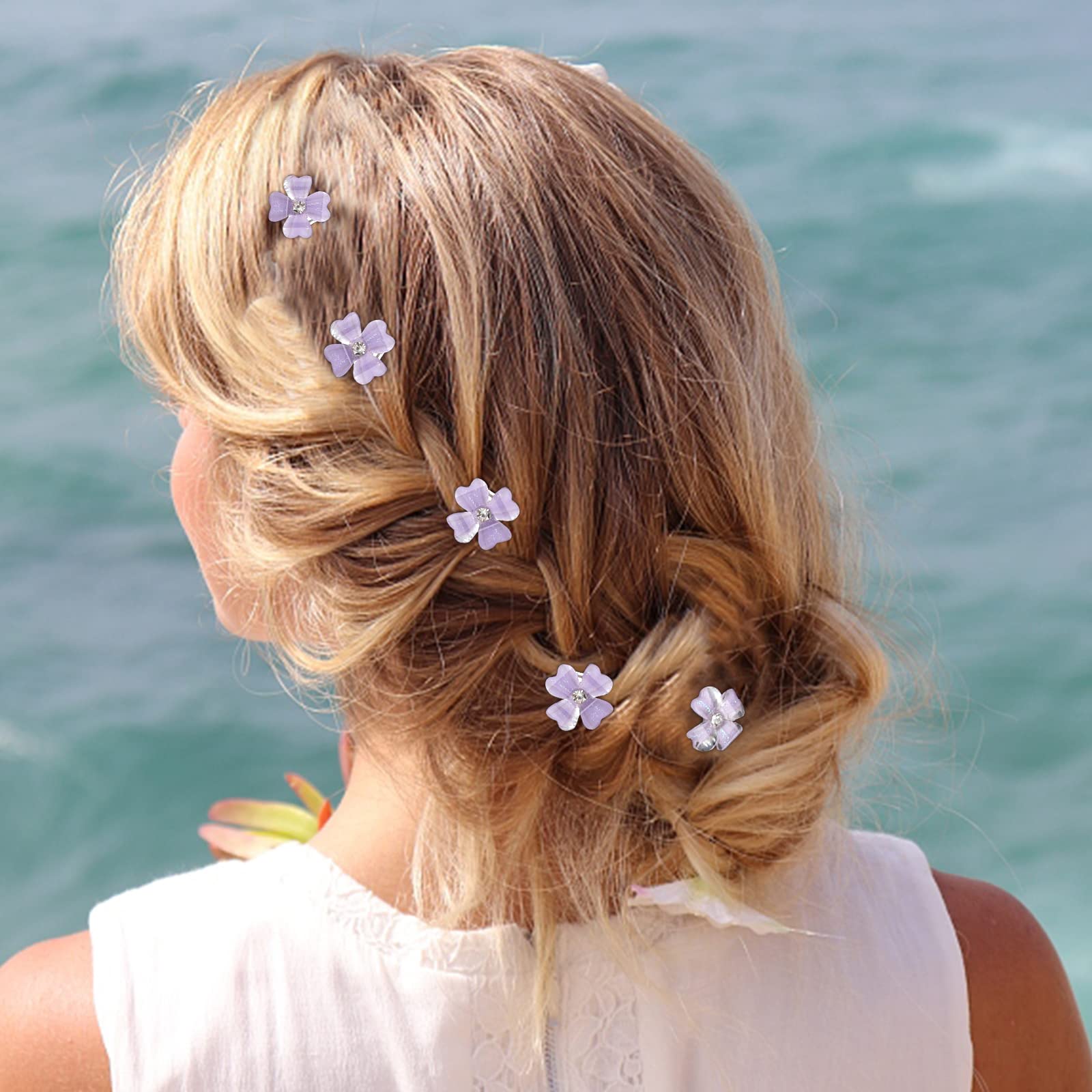 YISSION clips placed in half-up waves adding romantic accent to hairstyle